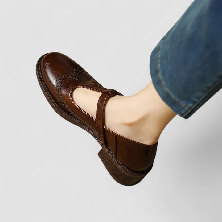 Black Mary Jane work shoes for women. Professional flats with a secure instep strap & classic rounded toe for comfort.