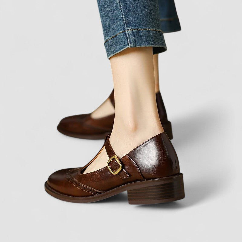 Elegant women's Mary Jane work shoes with secure instep strap. Classic style & comfortable for long office hours.