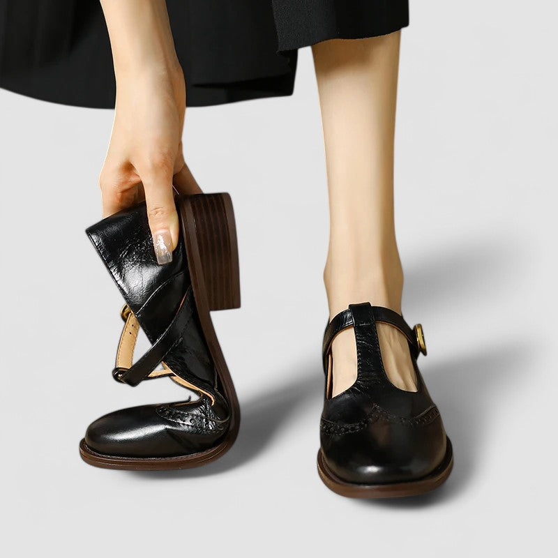 Brown women's classic Mary Jane shoes. Comfortable flats with secure instep strap & rounded toe for daily wear.