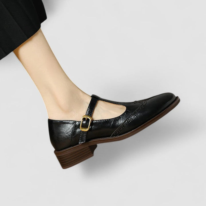 Stylish brown Mary Jane shoes for women. Vintage-inspired flats with secure instep strap & rounded toe for versatile outfits.