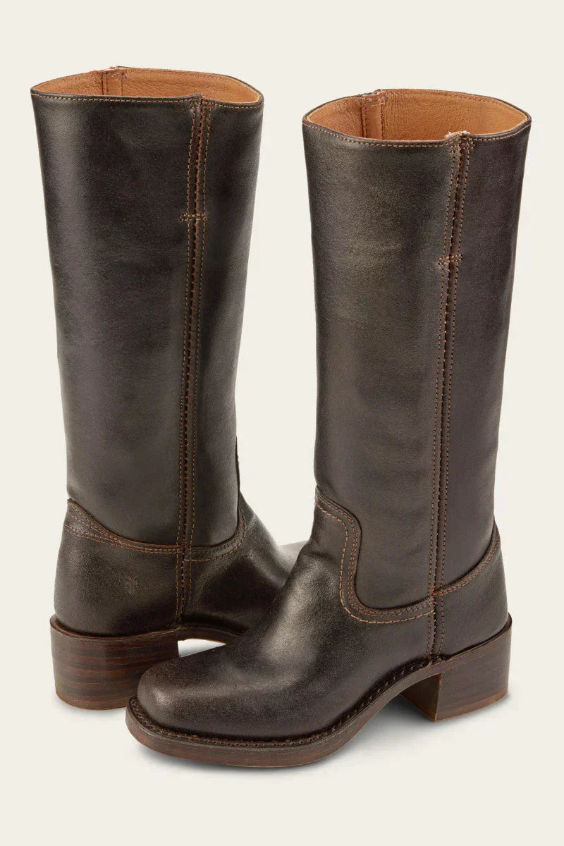 Brown women's cowboy boots with a stacked heel, offering a stylish lift and authentic country western feel.