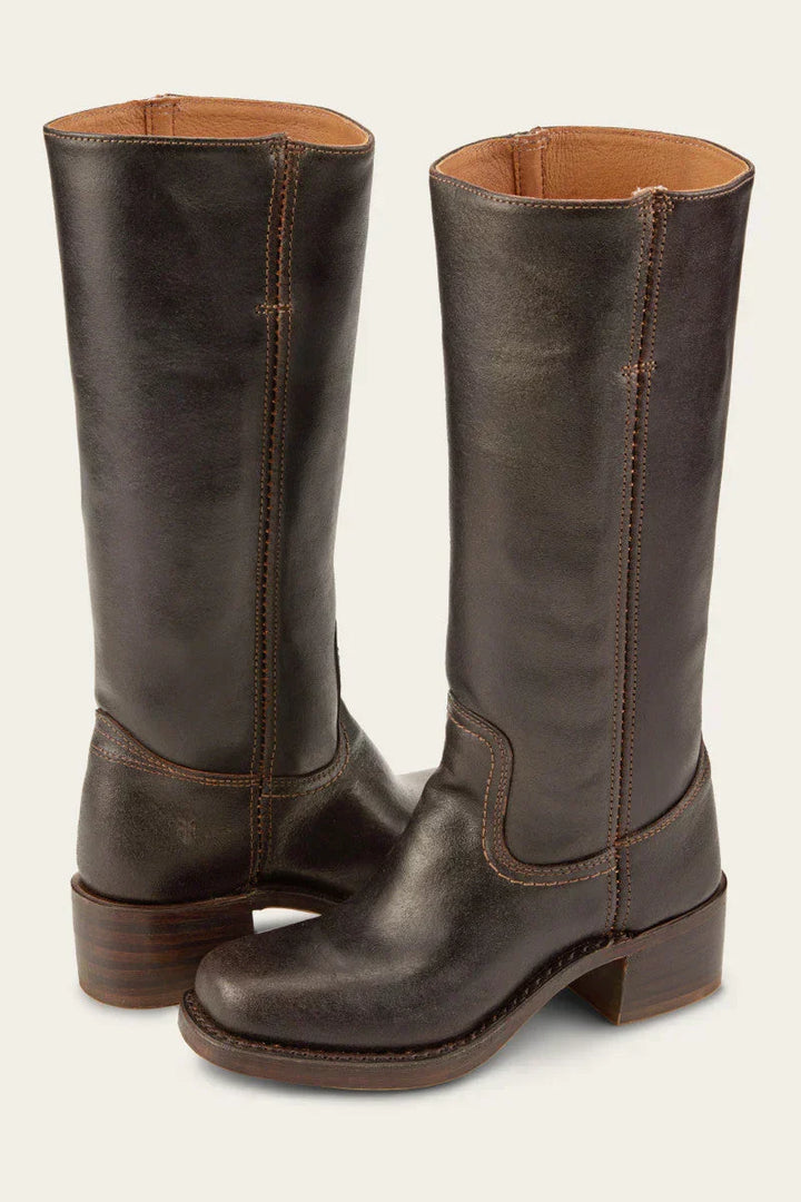 Brown women's cowboy boots with a stacked heel, offering a stylish lift and authentic country western feel.