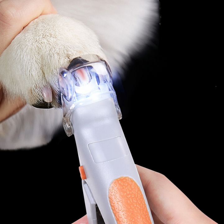 ClipLite LED pet nail trimmer with safety guard for safe dog and cat grooming.