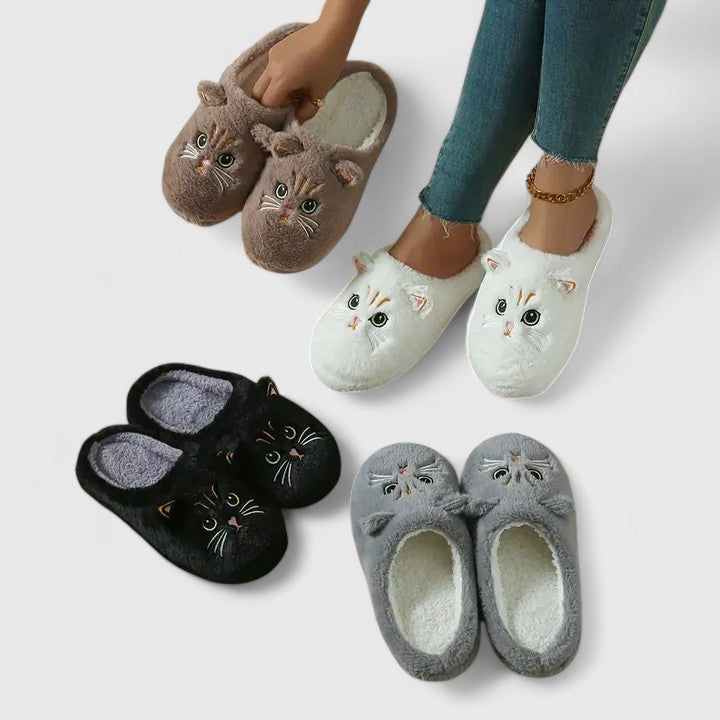 Women's plush indoor slippers with a sturdy non-slip sole, designed for cozy relaxation and support.