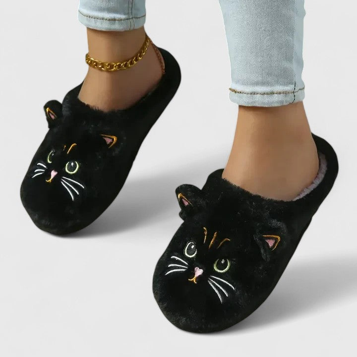 Pair of warm women's house shoes with arch support, ideal for ultimate indoor comfort and relaxation.