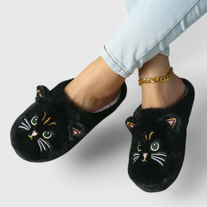 Stylish gray women's slippers, offering cozy comfort and a non-slip design for secure home wear.