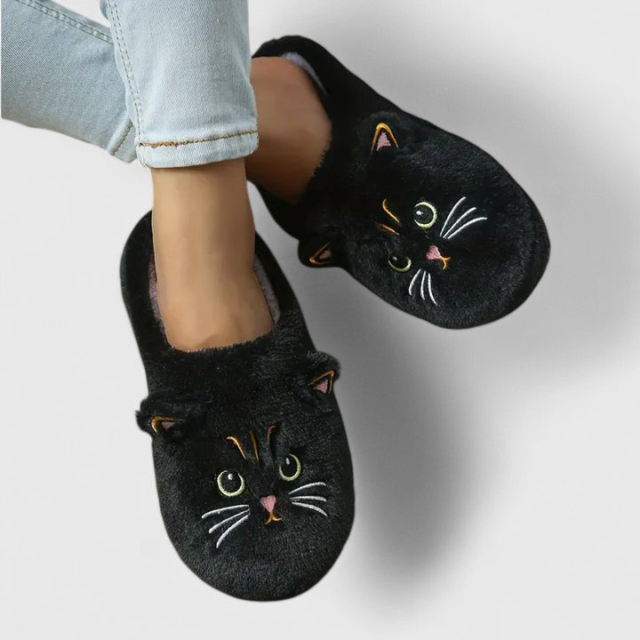 Fluffy blue women's indoor slippers with a soft sole, ensuring warmth and comfort for everyday home use.