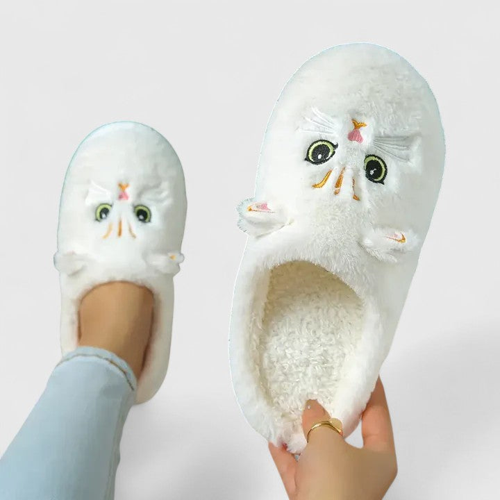 Luxurious women's winter slippers in cream, providing ultimate warmth, soft comfort, and non-slip security.