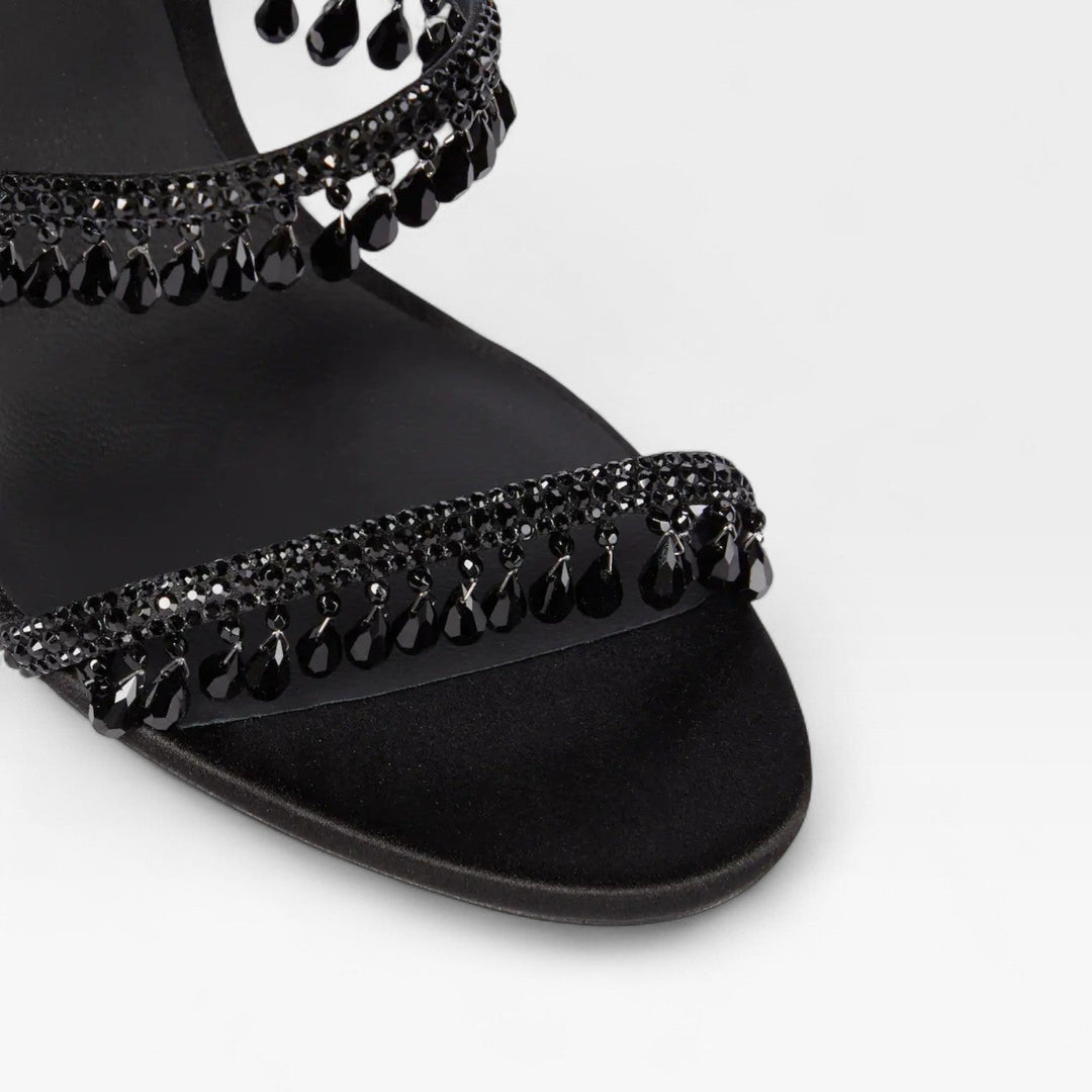 Shimmering gold block heels, featuring elegant crystal detailing for any formal event or wedding.