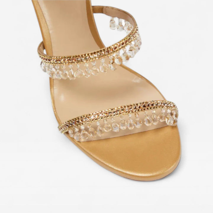 Comfortable gold block heels with dazzling crystal accents, perfect for all-day wear at weddings.