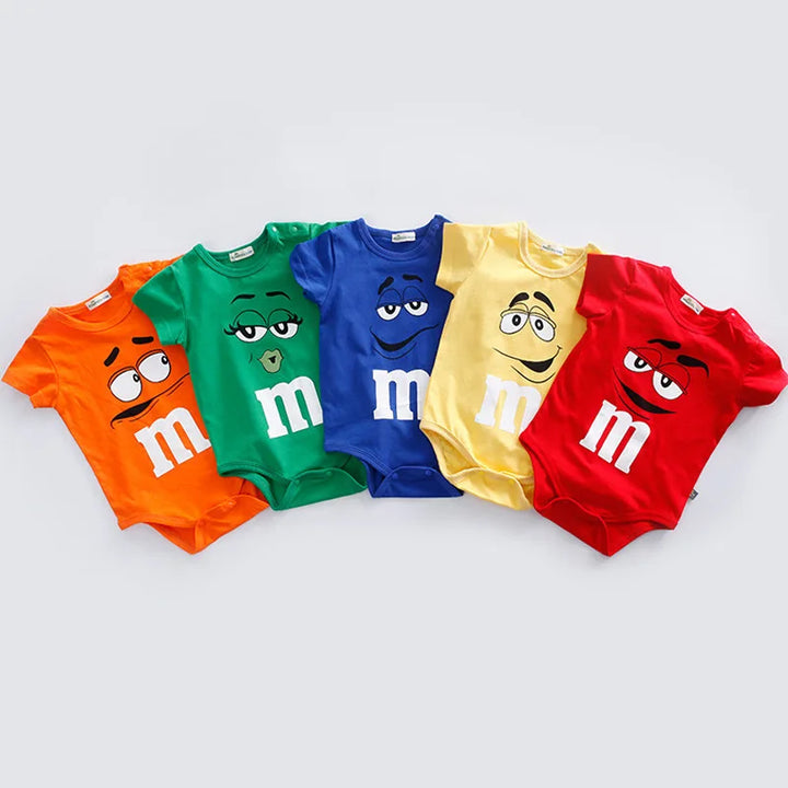 Comfortable short sleeve M&M character baby romper. Colorful snap closure toddler outfit, perfect for active play.