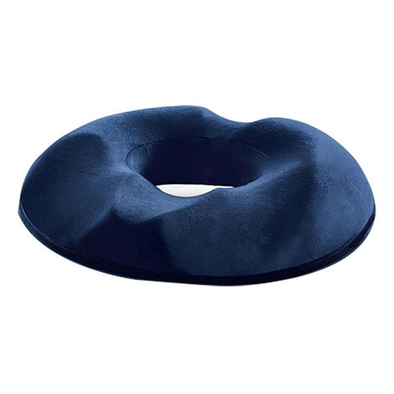 Coccyx relief cushion with breathable mesh cover for added comfort.