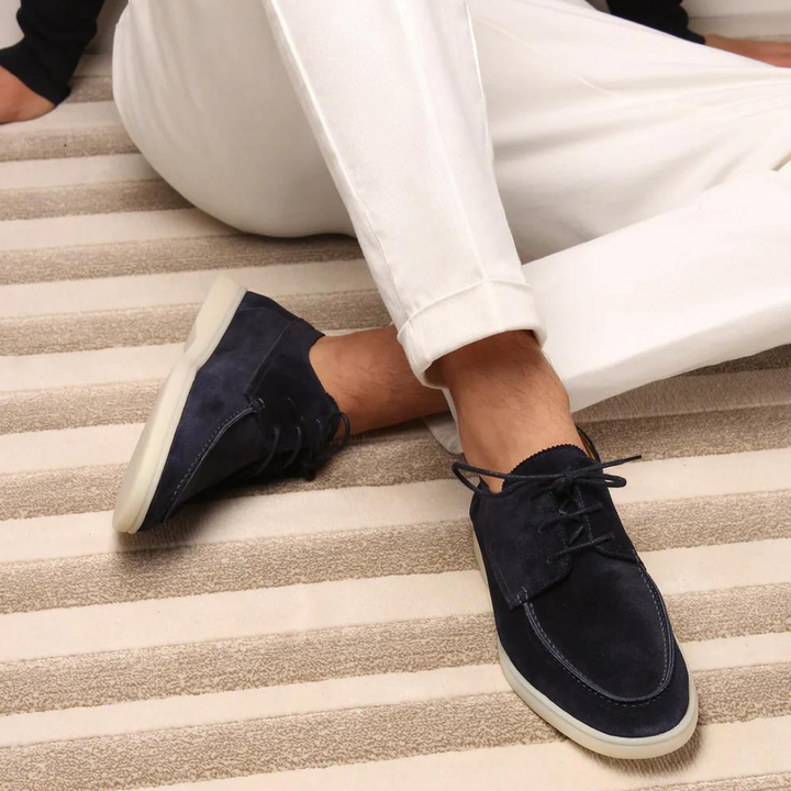 Comfortable black suede men's casual sneakers for everyday wear, featuring a relaxed style and lace-up design.