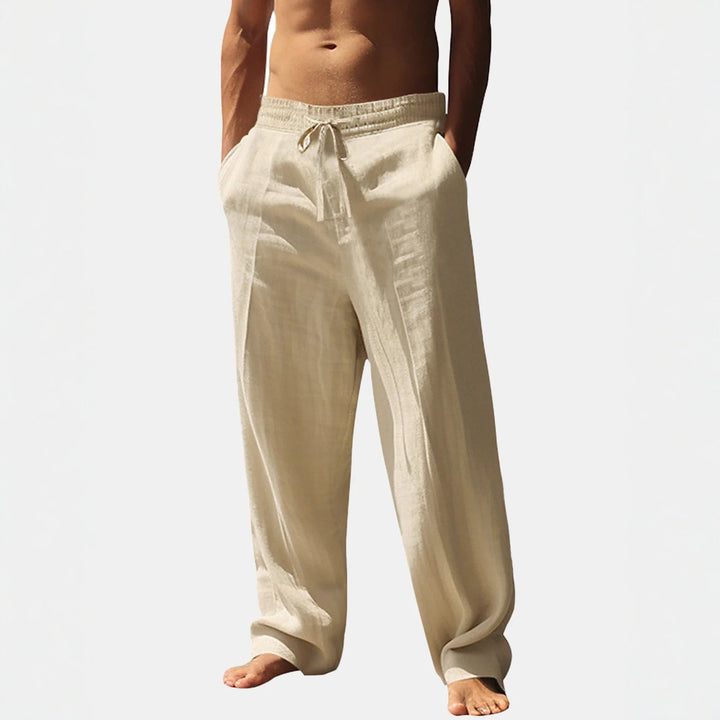 Versatile men's casual pants: lightweight, elastic waistband, straight leg & pockets for warm weather.