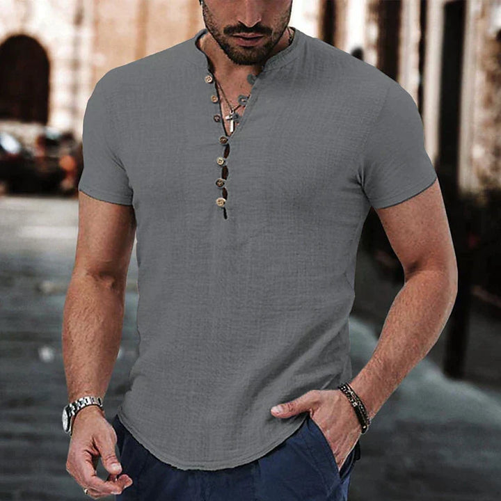 Stylish men's breathable henley shirt with a button neck, ideal for urban fashion and versatile wear.