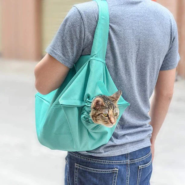 Comfortable pet carrier bag for cats with secure closure for safe travel.