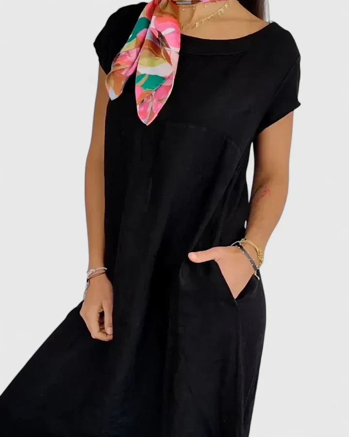 Chic A-line women's midi dress with pockets, offering ultimate comfort for daily wear and versatile styling.