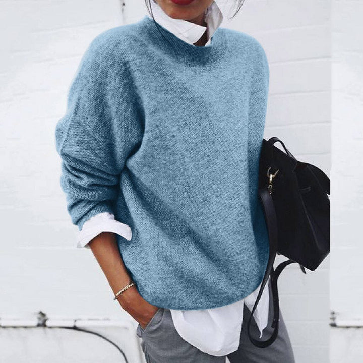 Stylish women's v-neck sweater, a versatile long-sleeve top for everyday casual chic fashion.