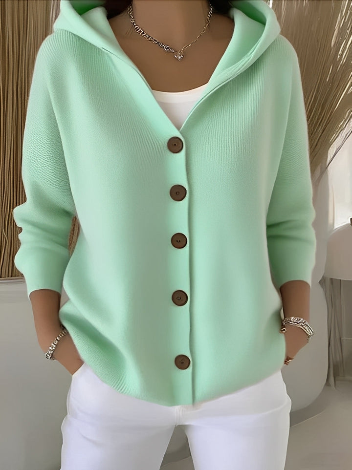 Knitted long-sleeve women's cardigan with hood & button front, perfect for relaxed spring & winter style.
