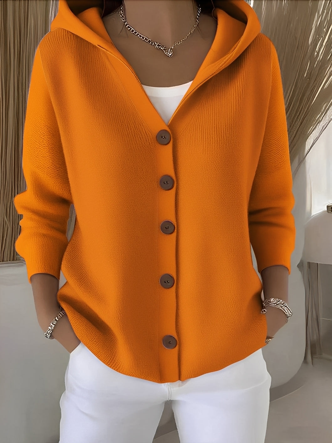 Relaxed fit hooded button-front cardigan for women, a cozy and stylish choice for casual everyday wear.