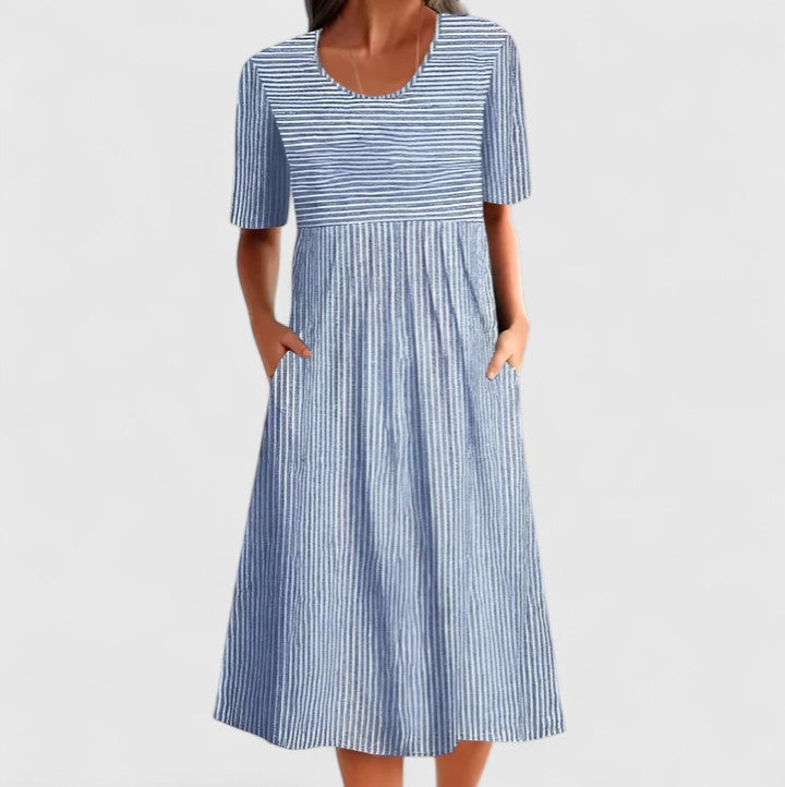 Comfortable women's striped midi dress in blue & white, perfect for casual summer days. Features breathable fabric.
