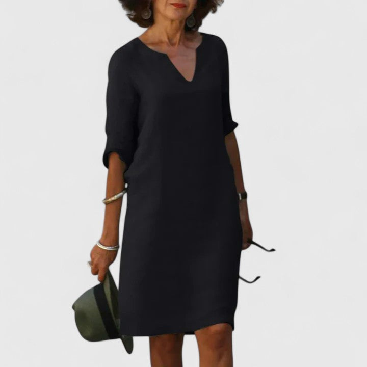 Comfortable women's V-neck dress, perfect for effortless everyday style. Chic and versatile summer wear.