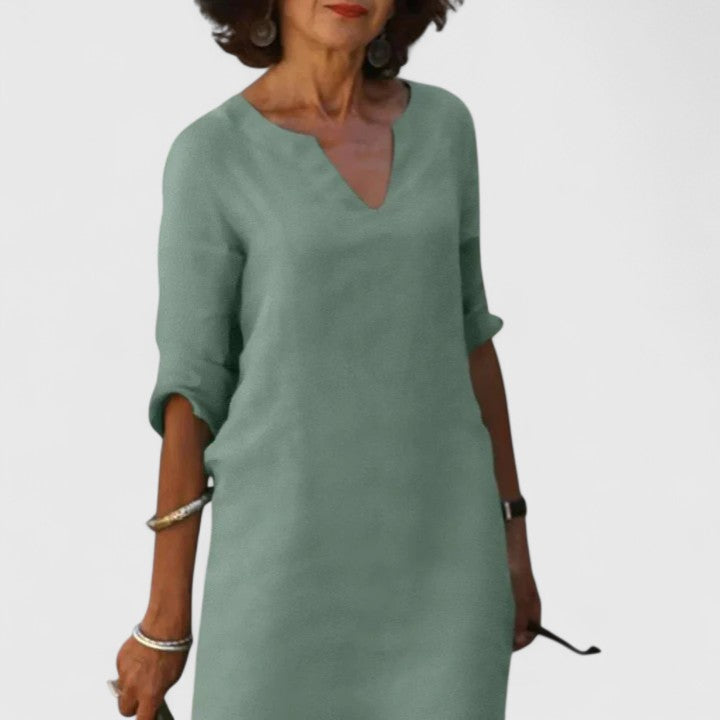 Effortless style with this comfortable women's V-neck dress. Versatile for casual summer days or elegant evenings.