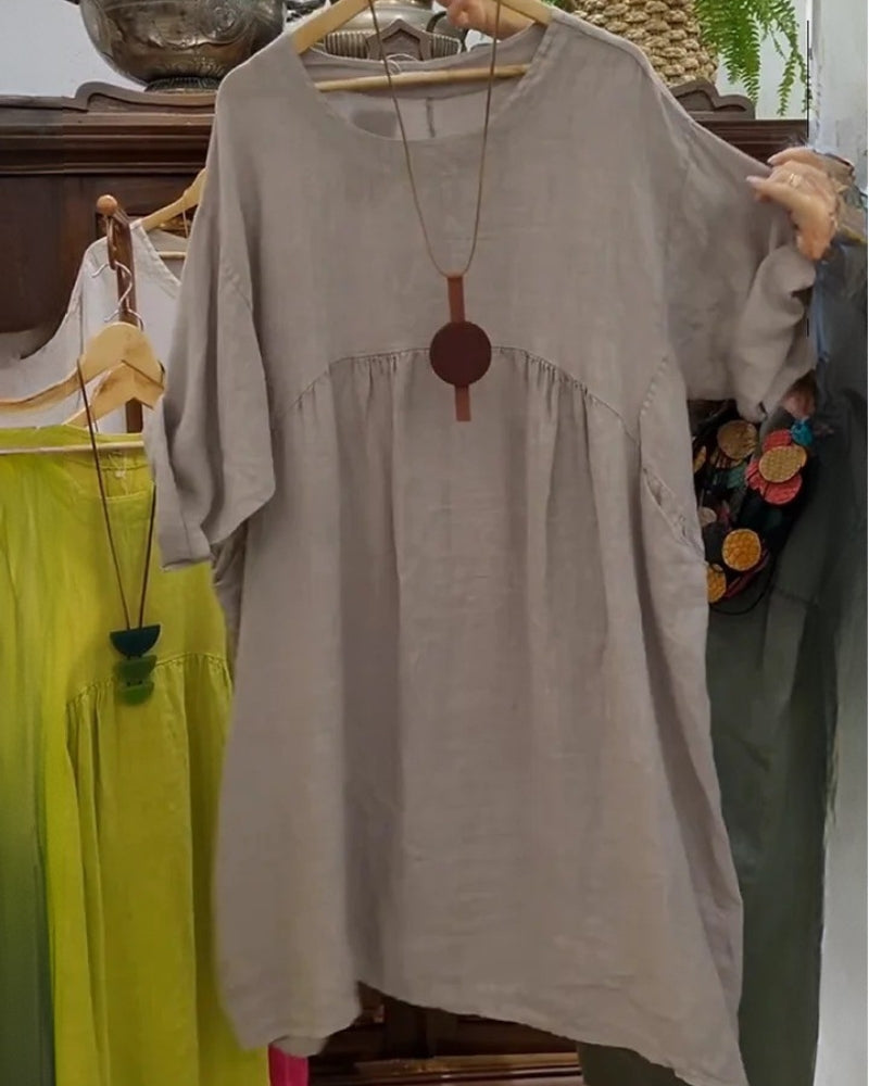 Soft women's flowy midi dress for comfortable everyday wear. Features relaxed fit and belly coverage.