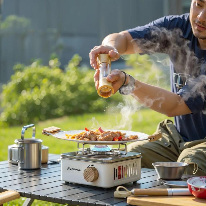 Compact portable camping gas stove with high power, perfect for outdoor cooking & backpacking adventures.