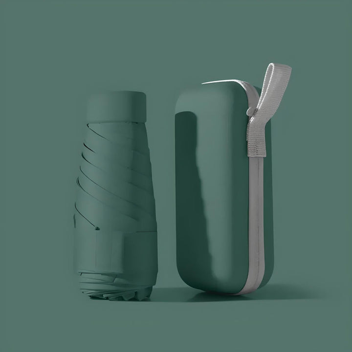 Portable umbrella for travel, offering sun protection and rain gear.