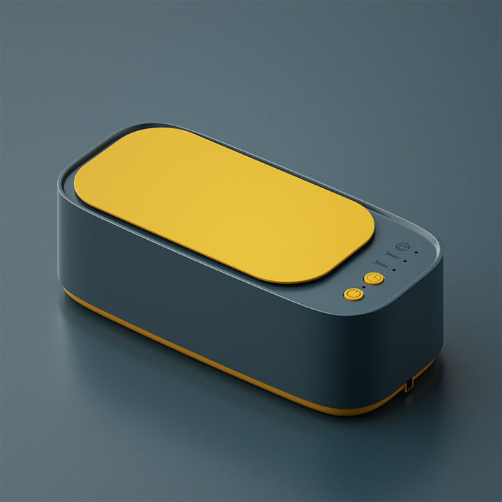 Portable ultrasonic cleaner restoring clarity to eyeglasses. Ideal for home use, gentle & effective.