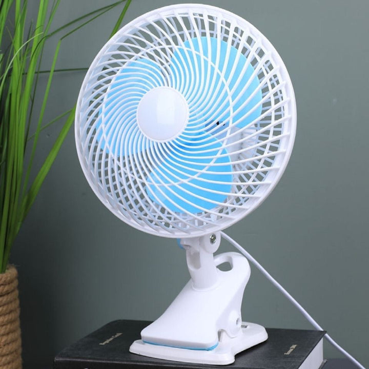 Adjustable speed desk fan, a portable cooling solution for personalized airflow comfort.