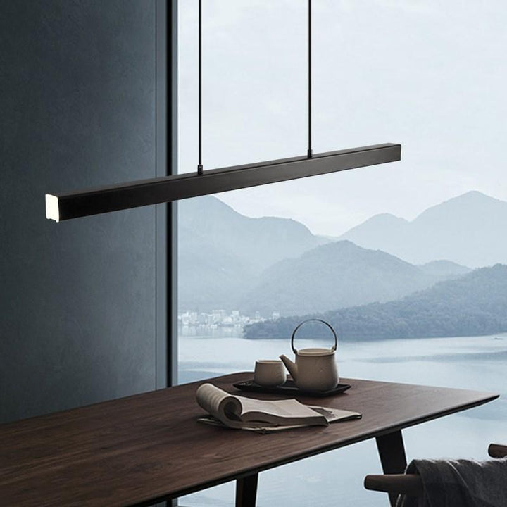 Modern adjustable LED linear pendant light, perfect for dining room task lighting.