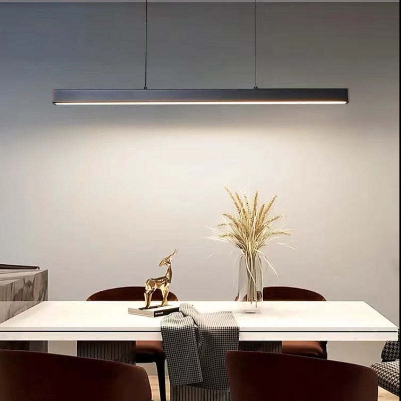 Sleek contemporary brown linear LED pendant for stylish home lighting decor.