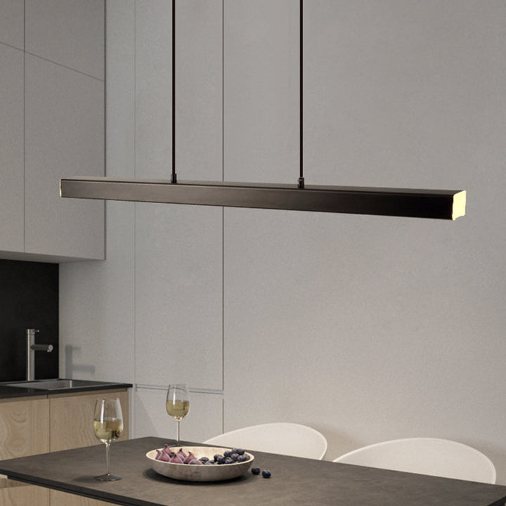 Dimmable black linear LED pendant, a modern ceiling fixture for contemporary kitchens.