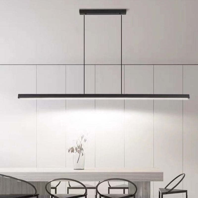 Elegant linear LED pendant light, contemporary design for modern dining room spaces.