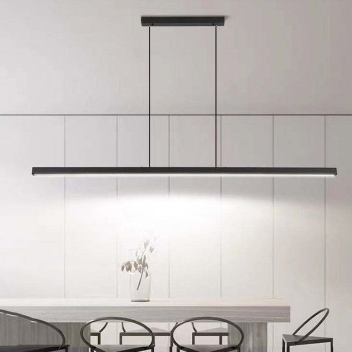 Elegant linear LED pendant light, contemporary design for modern dining room spaces.