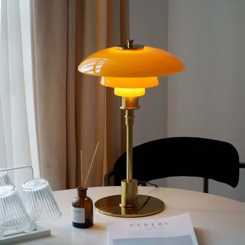 Contemporary Danish LED table lamp with warm ambient glow.