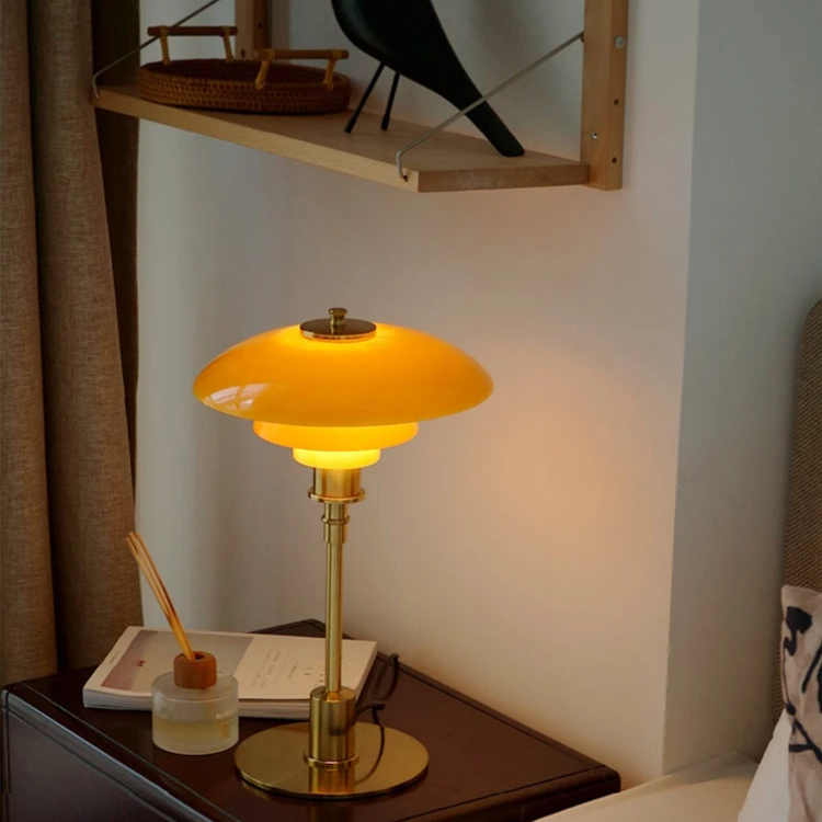Scandinavian design LED table lamp providing soft ambient light.