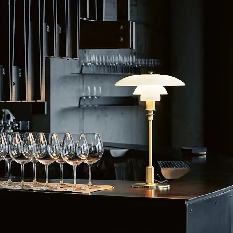 Elegant Danish modern LED table lamp, ideal for bedside lighting.