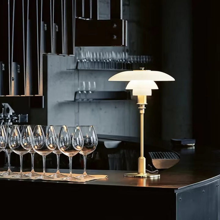 Elegant Danish modern LED table lamp, ideal for bedside lighting.
