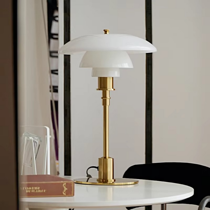 Warm ambient LED table lamp, contemporary Scandinavian style.