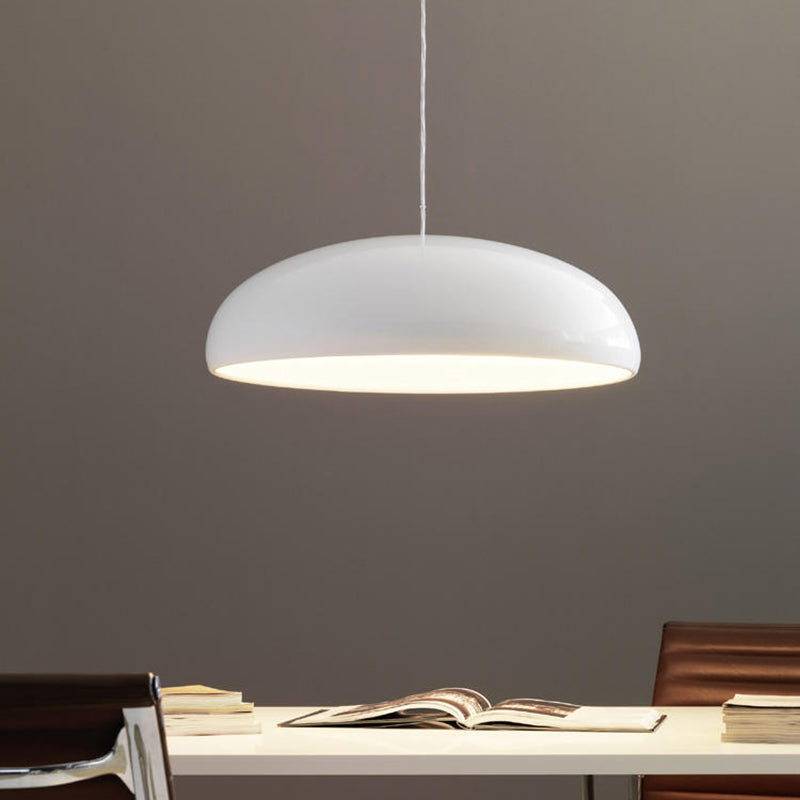 Sleek metal pendant lamp with adjustable light, perfect modern ceiling lighting for home decor.