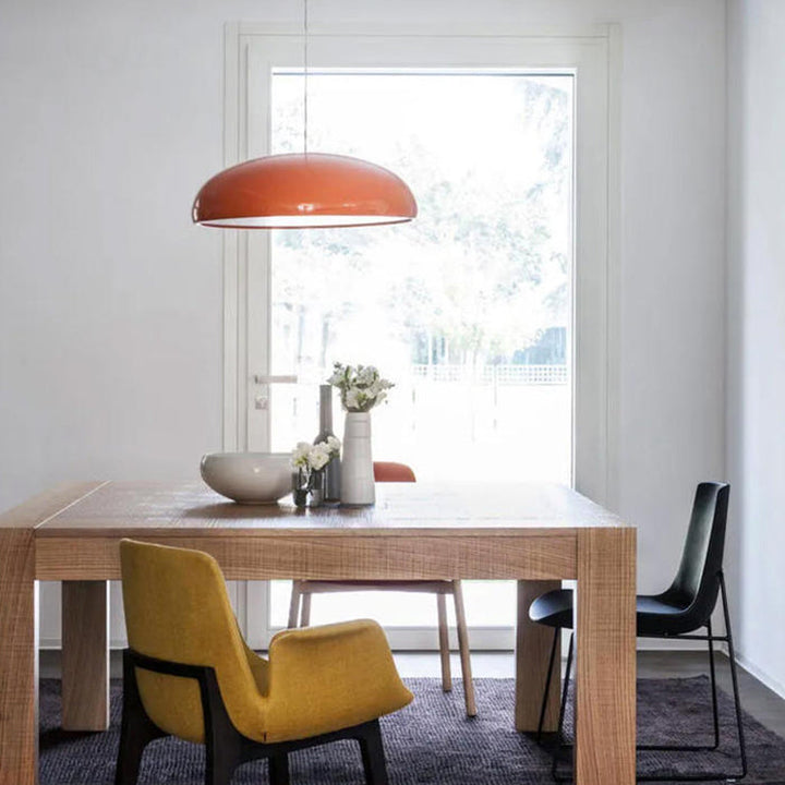 Minimalist contemporary metal pendant light, adjustable for perfect ambient modern lighting.