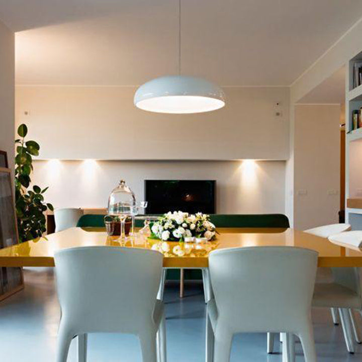 Adjustable ambiance pendant light, contemporary metal design offers versatile modern ceiling lighting.