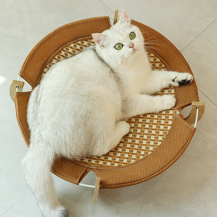 Rattan woven hanging cat bed, provides a cool and breathable elevated spot for cats to relax and nap.