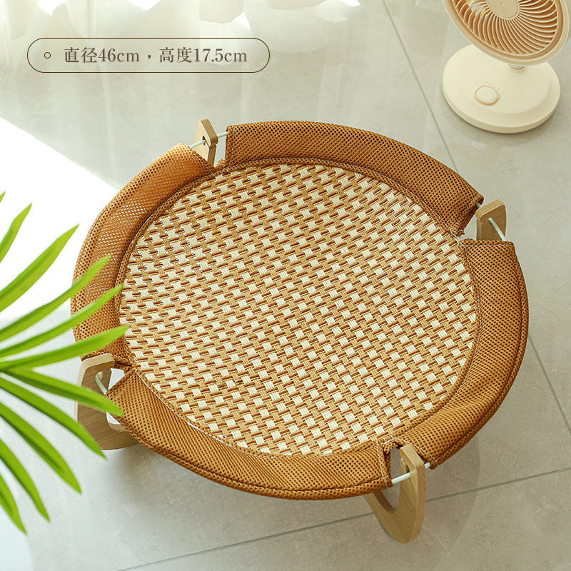 Summer cat bed: Cooling rattan hanging hammock. Elevated, breathable pet furniture for comfortable cat relaxation.
