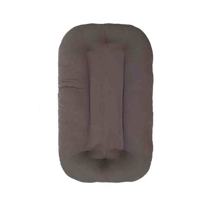 Cozy baby sleeping nest bed lounger for newborns, a comfortable portable baby bed.