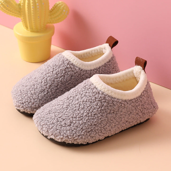 Fleece-lined boys' indoor shoes providing non-slip safety during playtime.