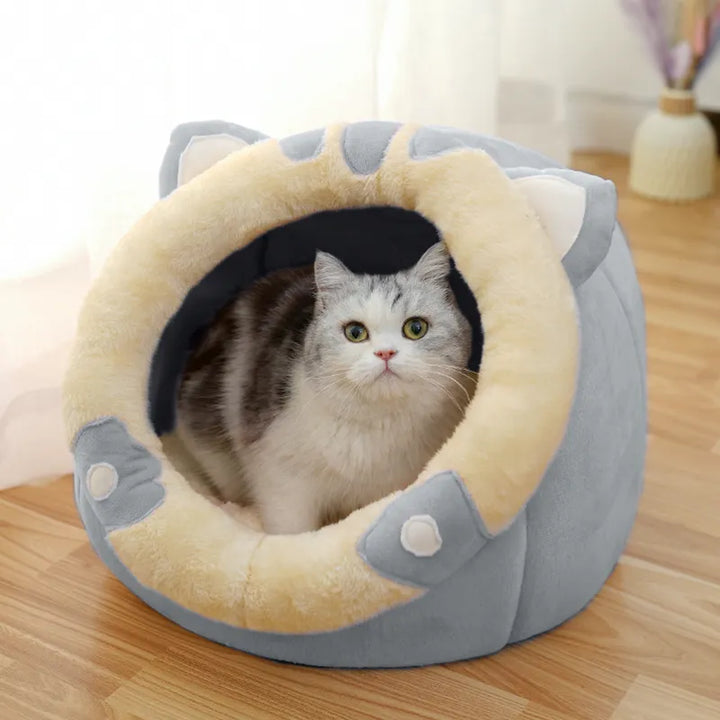 Plush cat furniture: a cozy cat cave bed featuring a playful ear design for your pet's comfort.